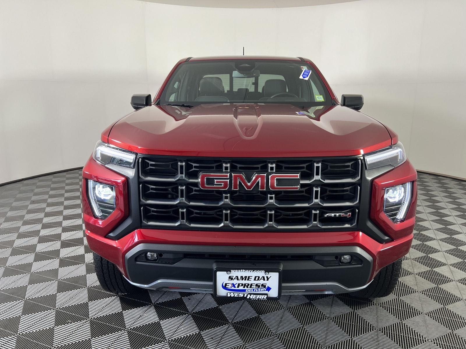 Used 2025 Volcanic Red Tintcoat GMC 4WD AT4 image 21