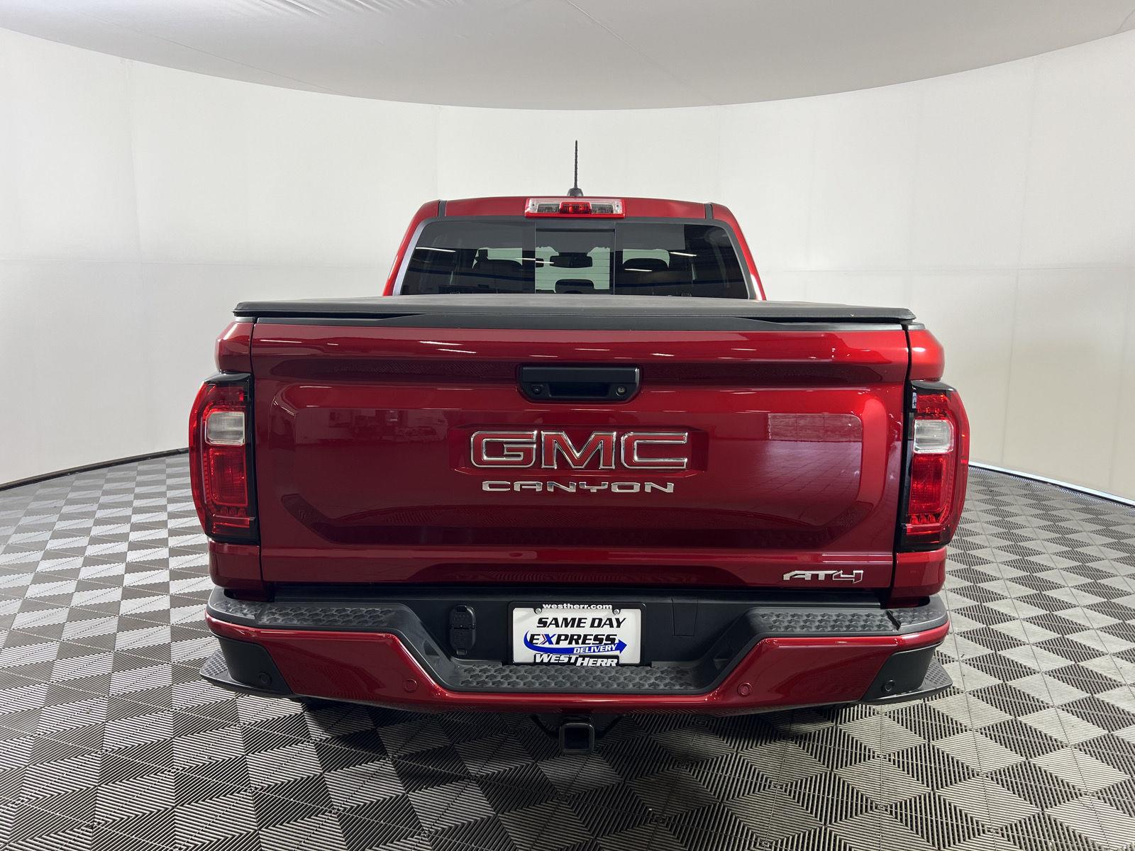 Used 2025 Volcanic Red Tintcoat GMC 4WD AT4 image 24