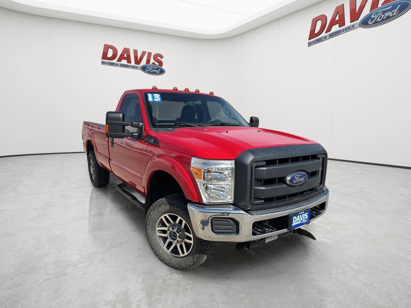 Vermillion Red 2013 Ford F-250 Super Duty Pickup Truck Four-Wheel Drive 6-Speed Automatic