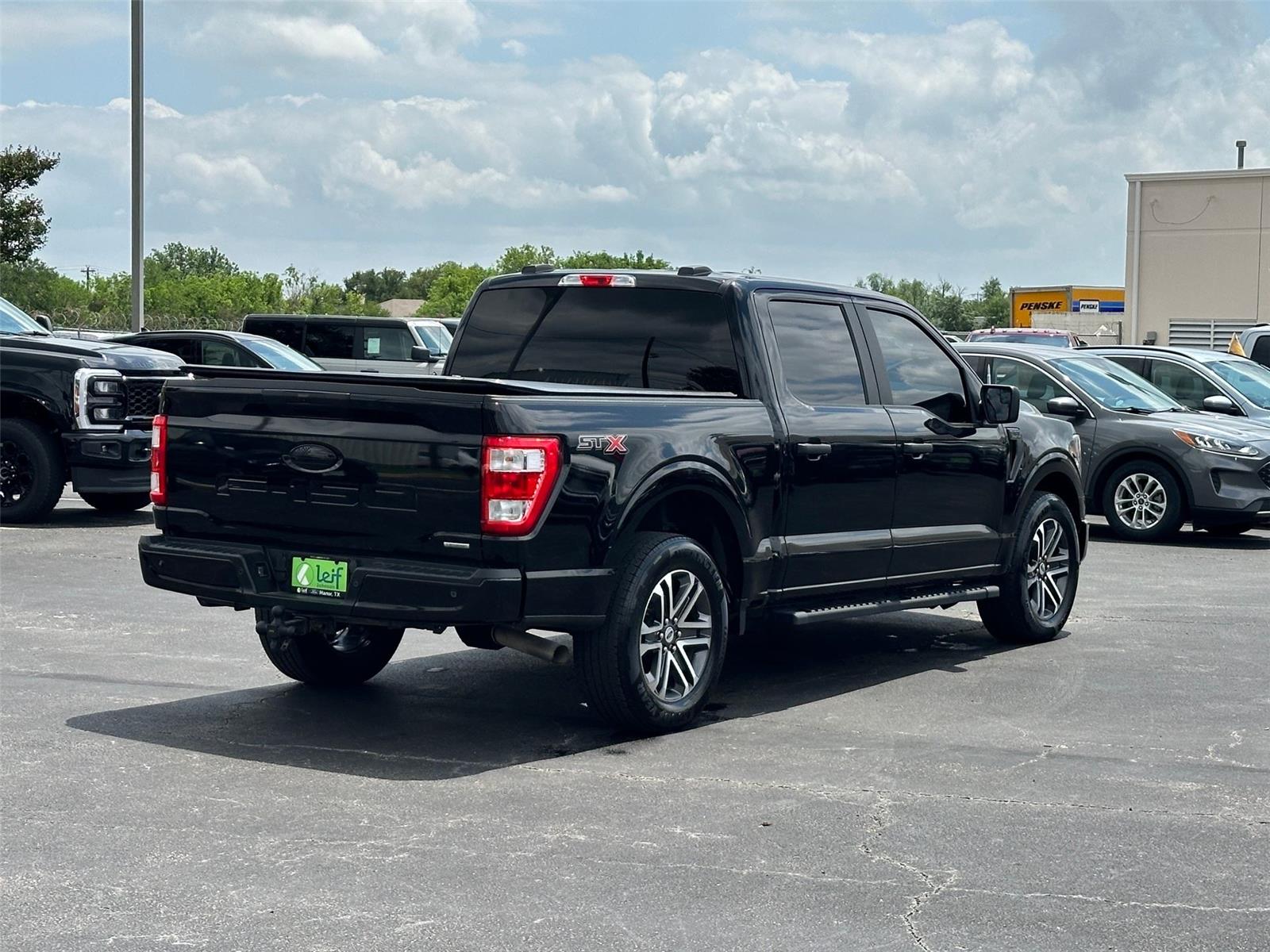 View vehicle photo 4