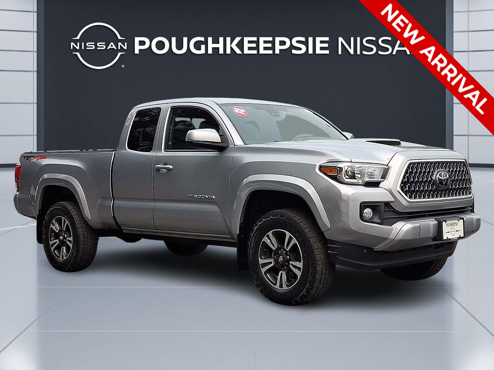 Silver Sky Metallic 2018 Toyota Tacoma Pickup Truck Four-Wheel Drive 6-Speed Manual