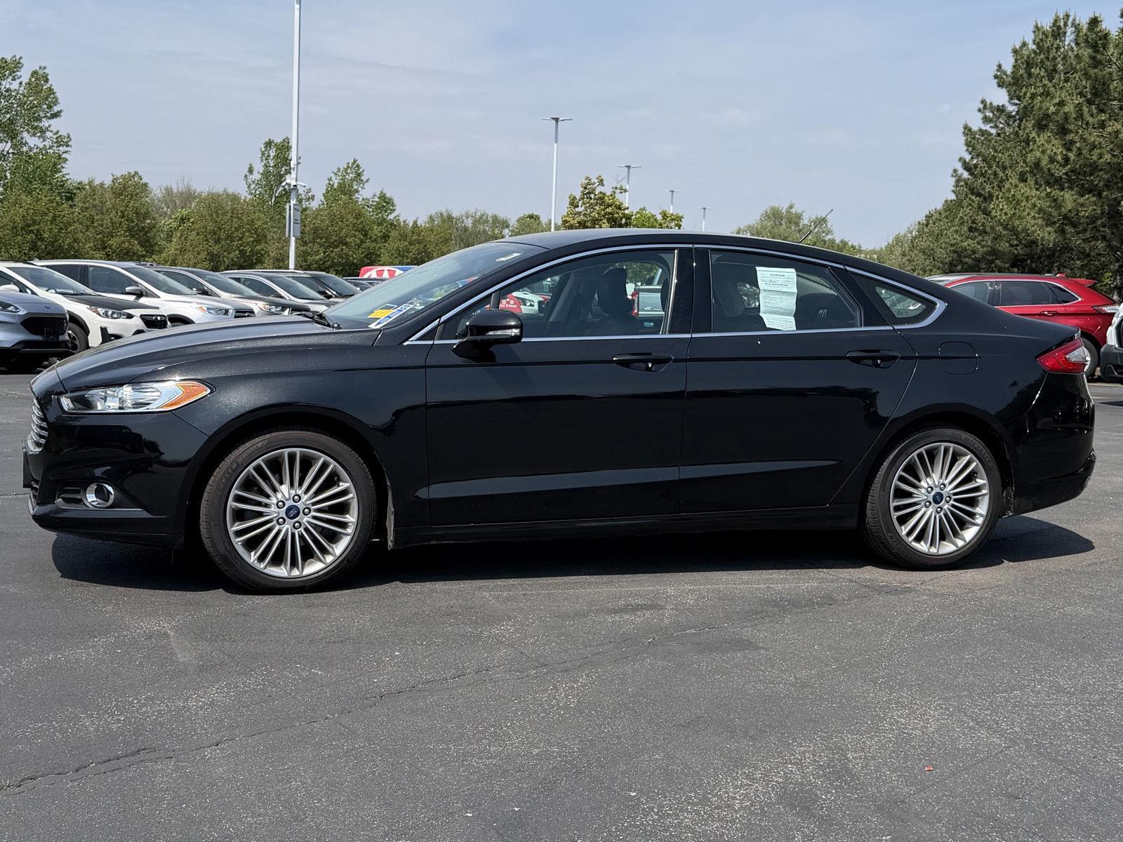 Used 2015 Tuxedo Black Ford SE image 4