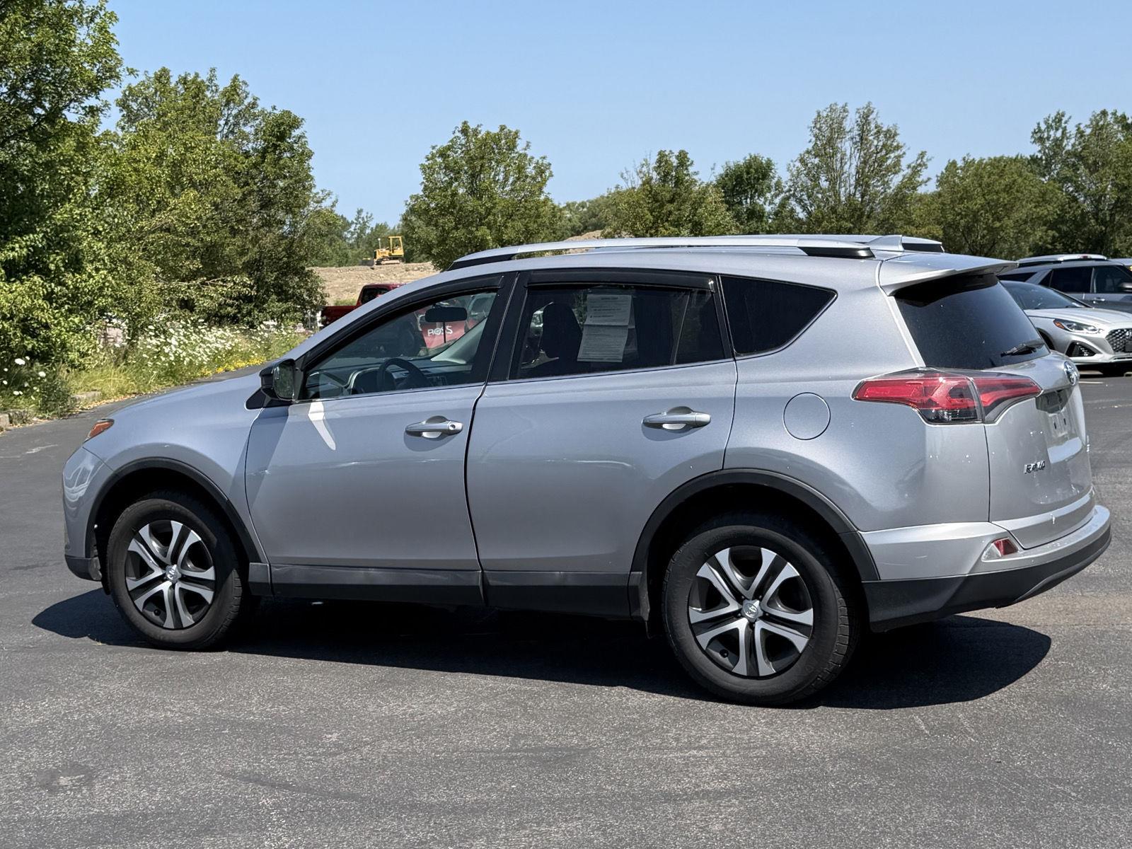 Used 2016 Silver Sky Metallic Toyota LE image 5