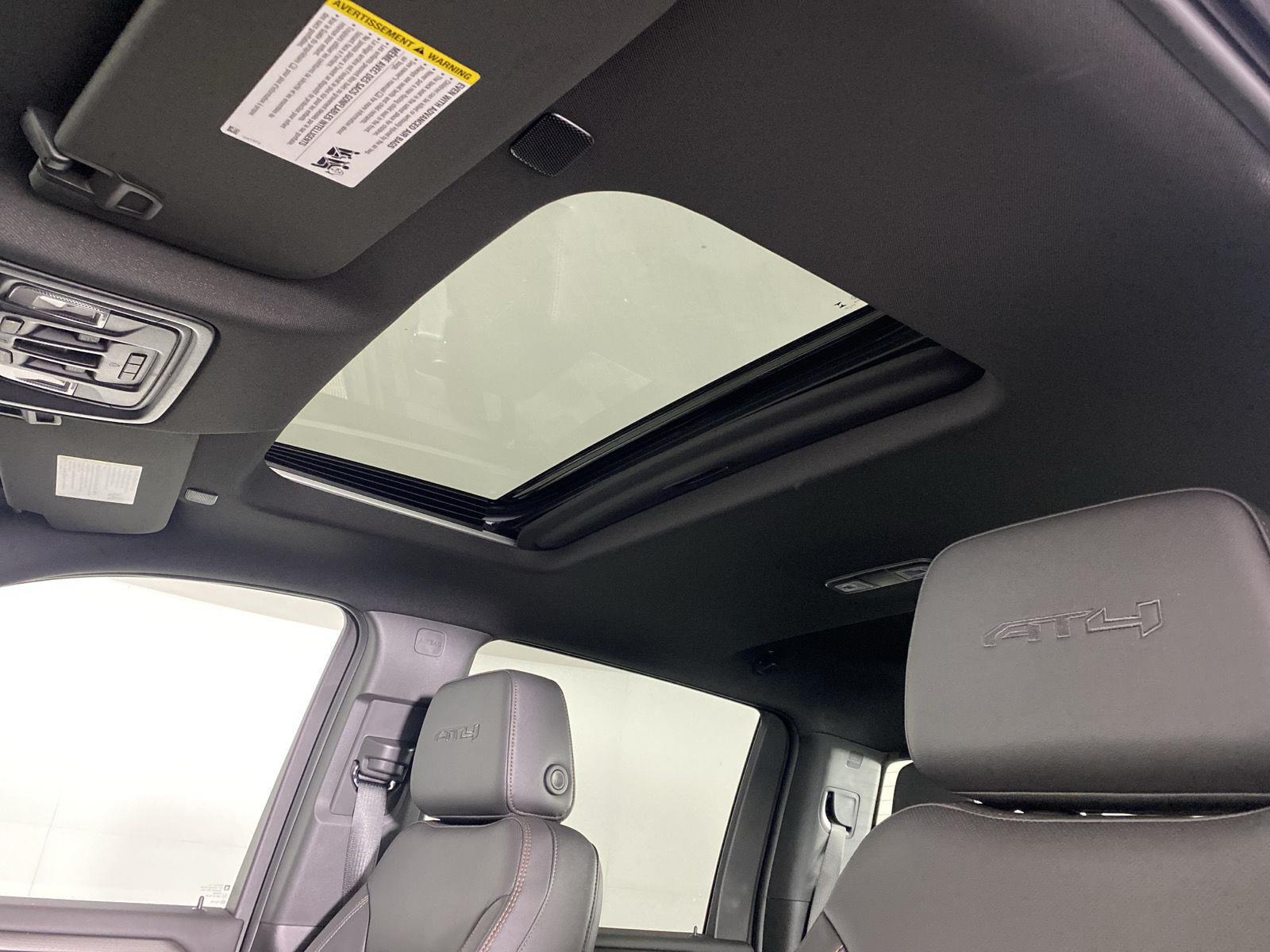 Used 2025 Summit White GMC AT4 image 24