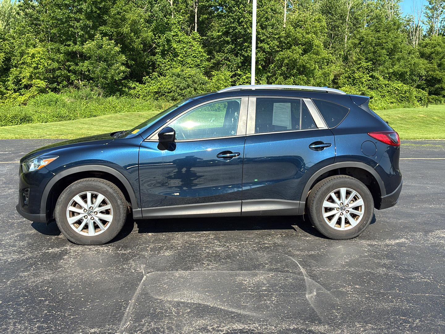 Used 2016 Deep Crystal Blue Mica Mazda Touring image 11