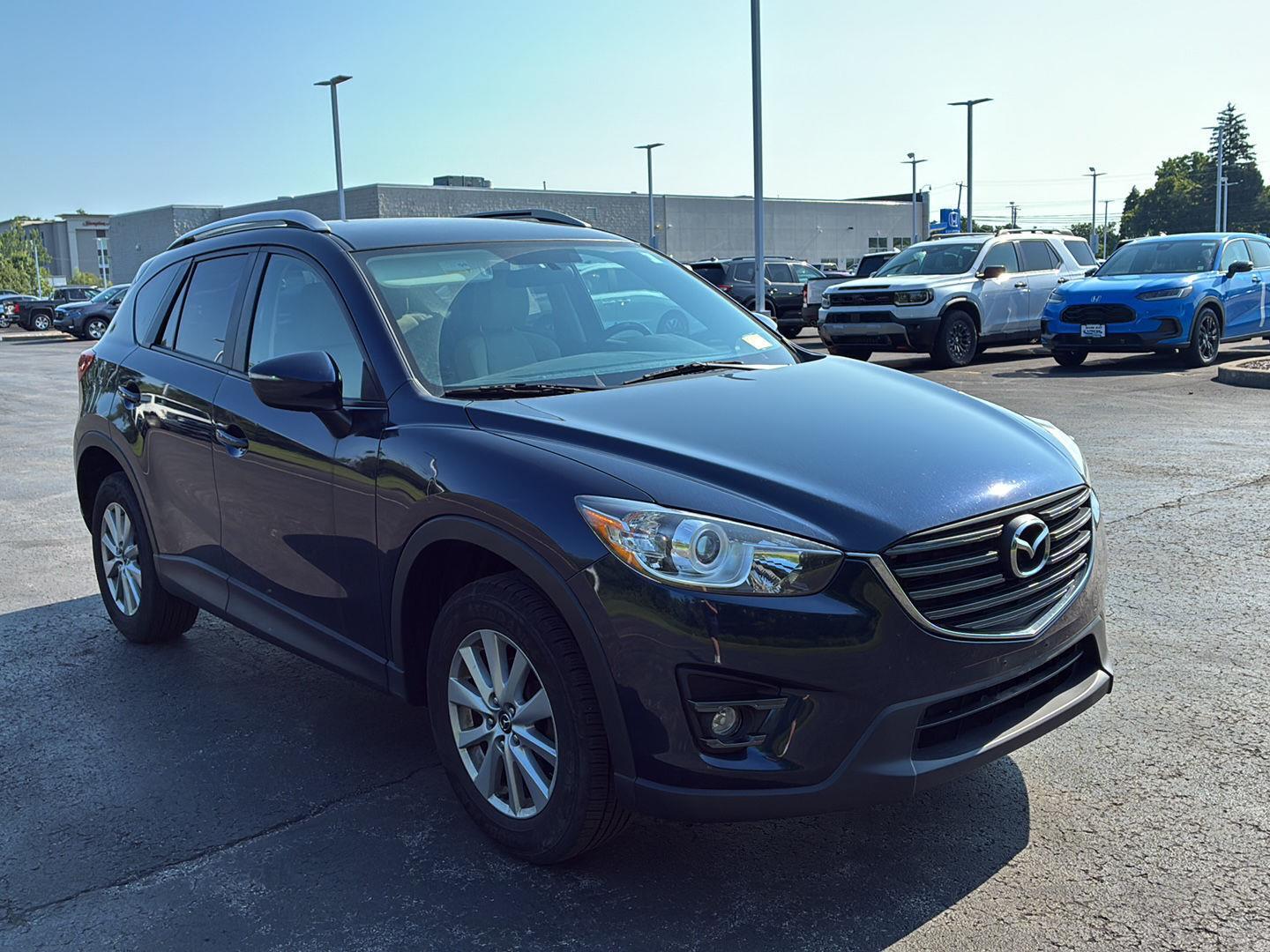 Used 2016 Deep Crystal Blue Mica Mazda Touring image 14
