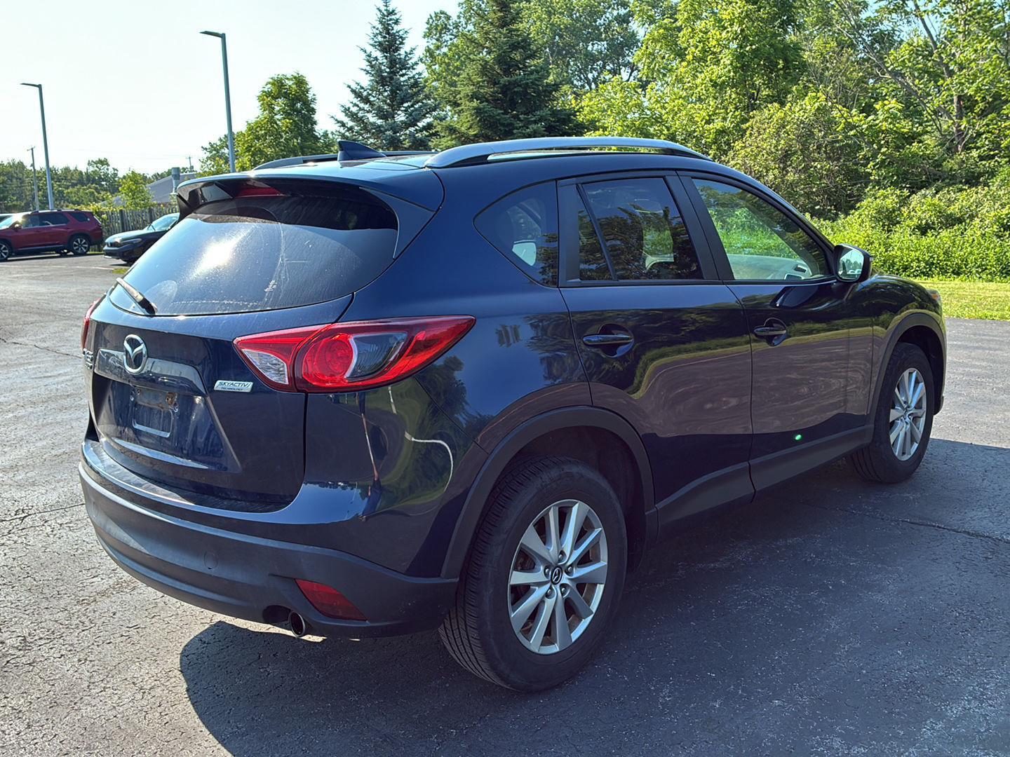 Used 2016 Deep Crystal Blue Mica Mazda Touring image 16
