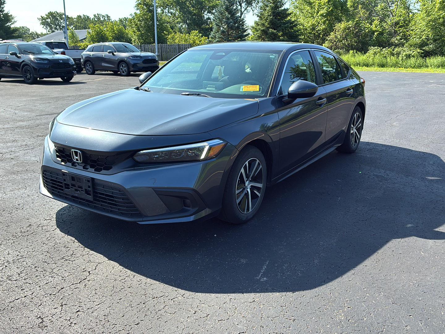 Used 2023 Meteorite Gray Metallic Honda LX image 11