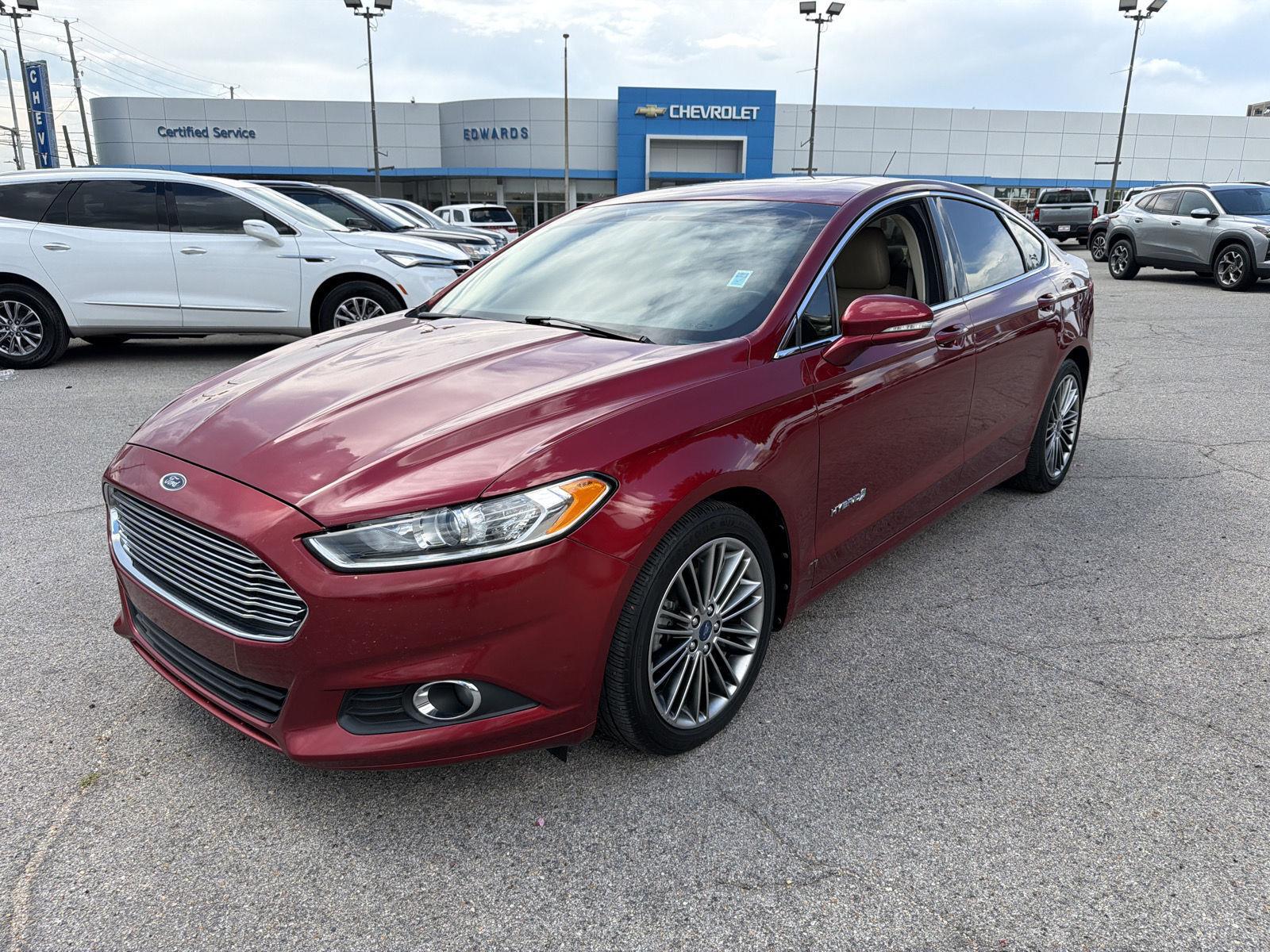 Ruby Red Metallic Tinted Clearcoat 2013 Ford Fusion Hybrid Sedan Front-Wheel Drive Continuously Variable Transmission