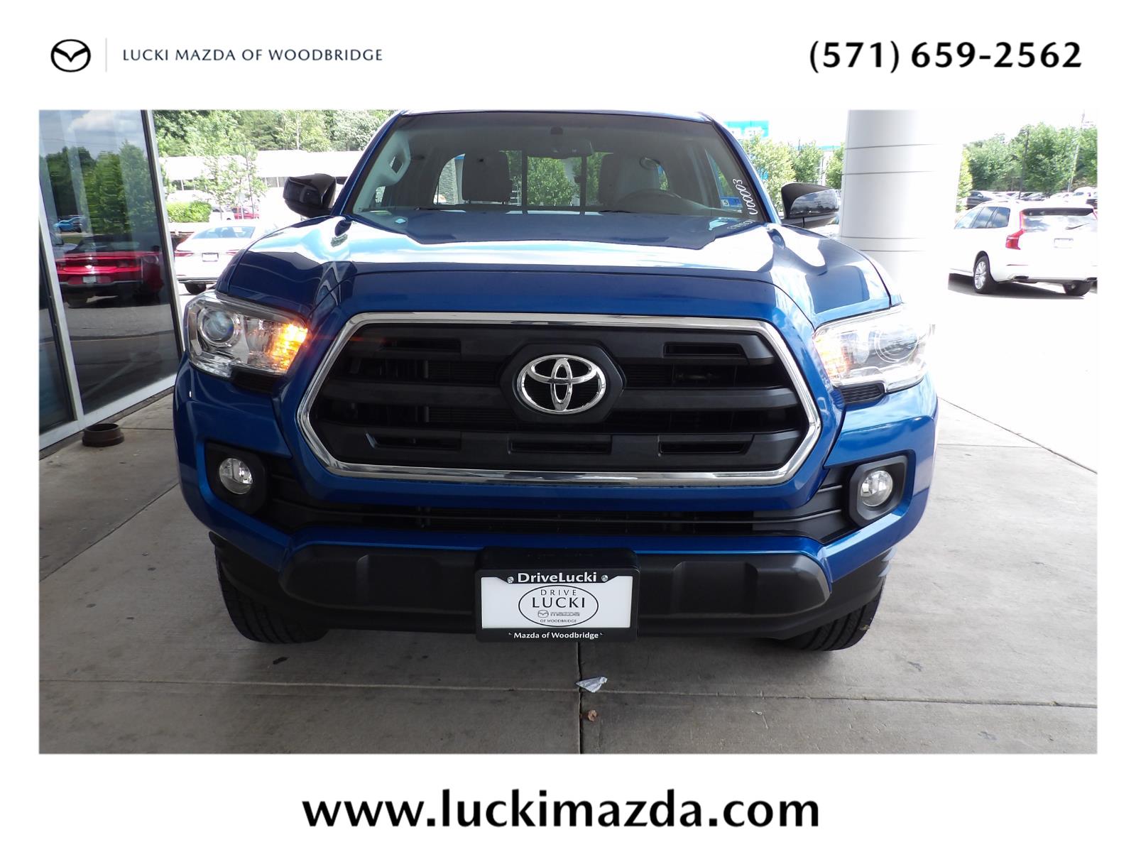 Blazing Blue Pearl 2016 Toyota Tacoma Pickup Truck Four-Wheel Drive 6-Speed Automatic