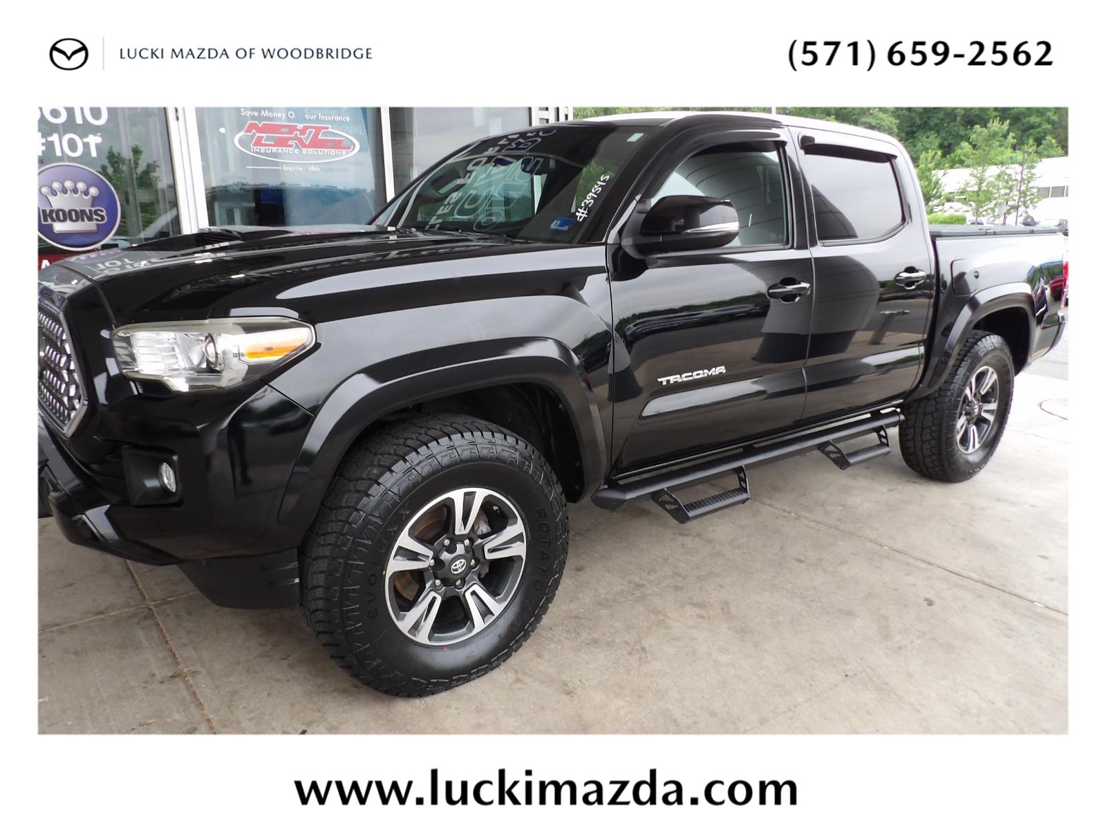 Midnight Black Metallic 2018 Toyota Tacoma Pickup Truck Four-Wheel Drive 6-Speed Manual