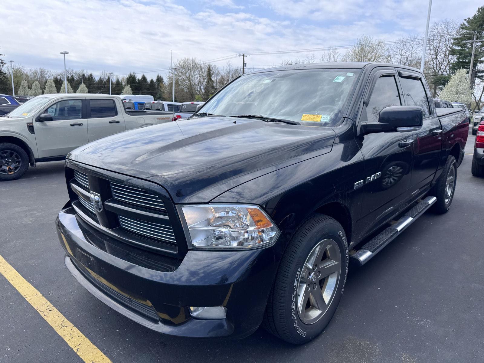Brilliant Black Pearl 2010 Dodge RAM 1500 Pickup Truck 5-Speed Automatic