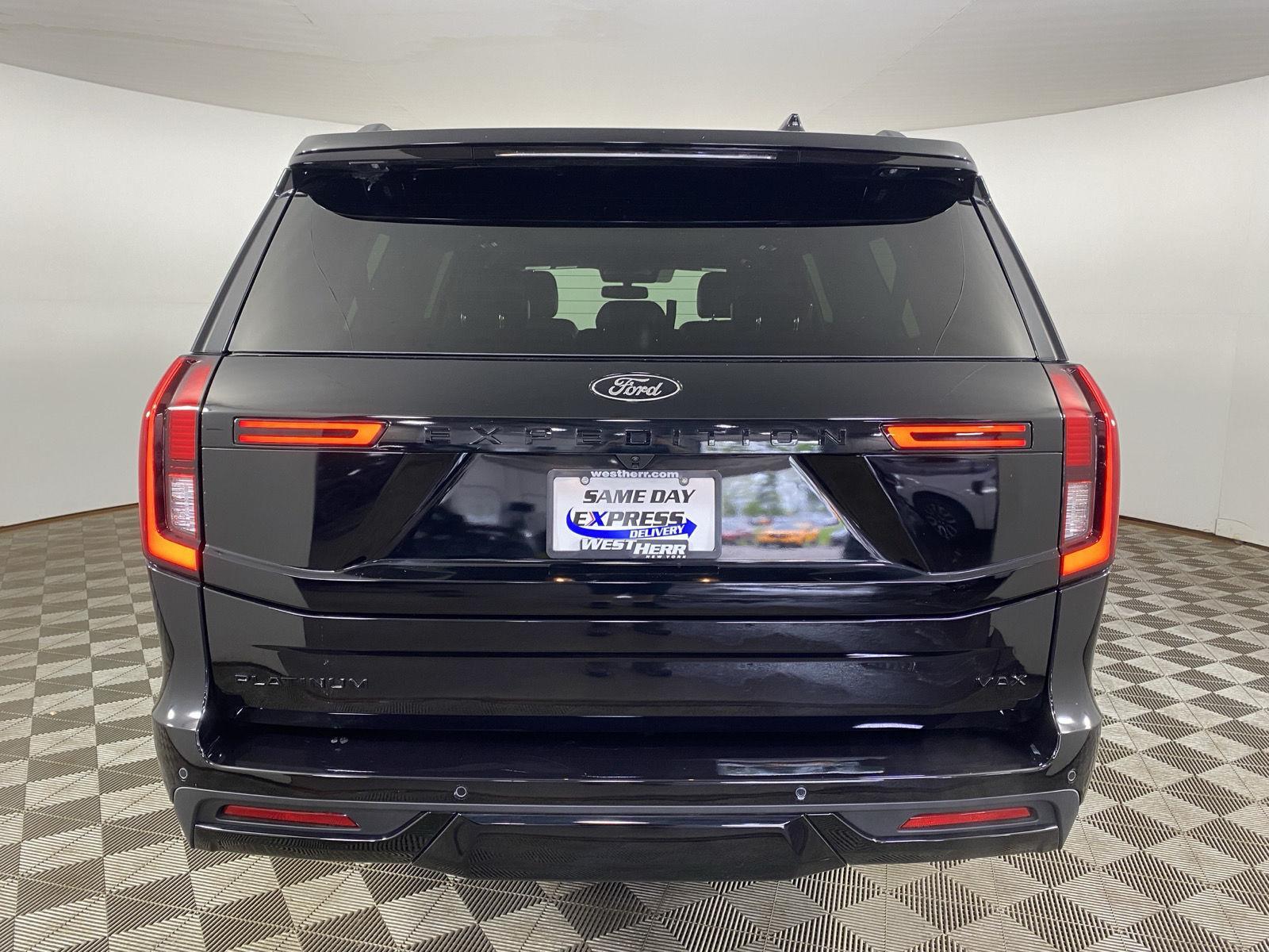 Used 2025 Black Metallic Ford Platinum image 6