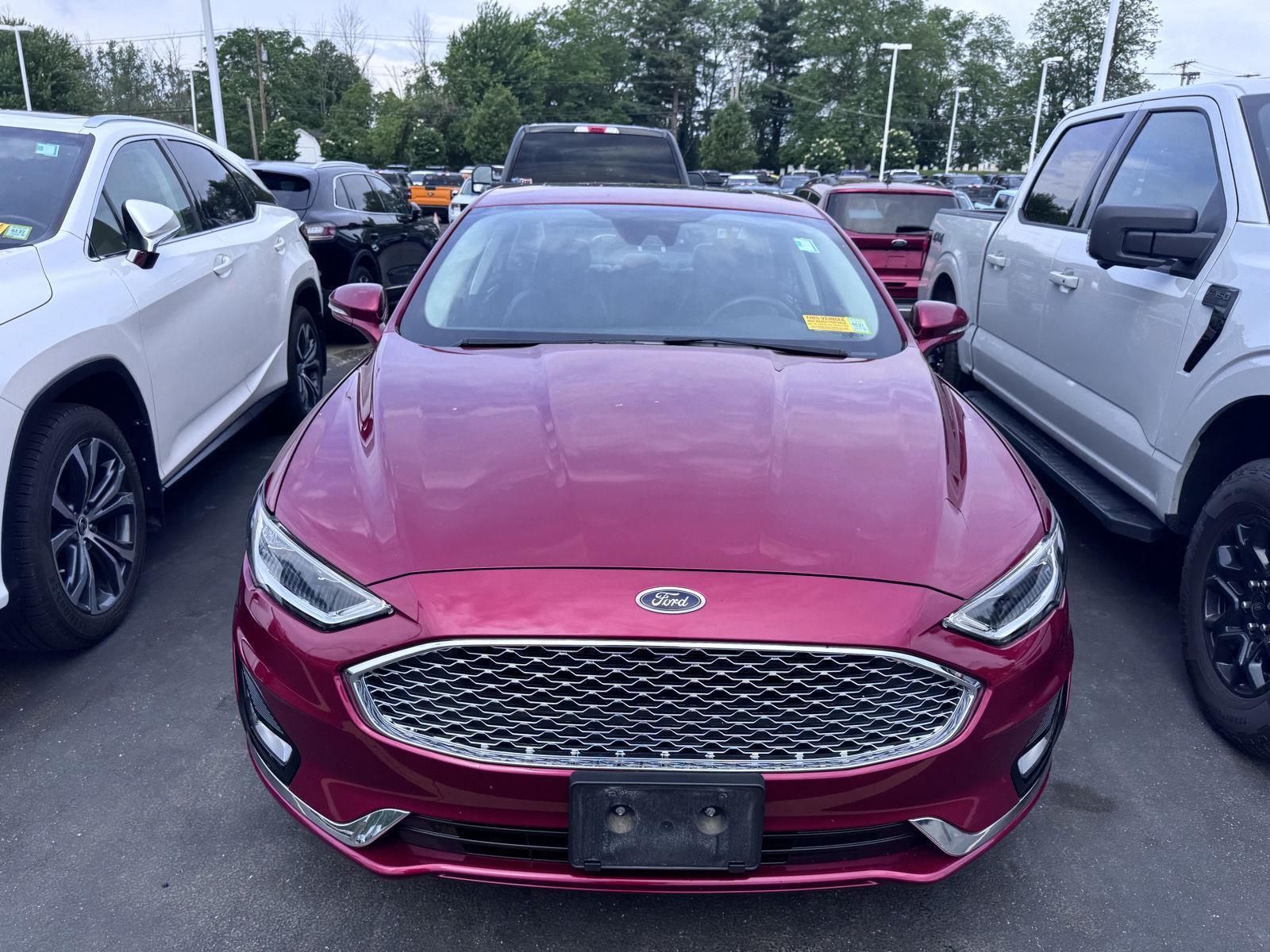 Used 2019 Ruby Red Metallic Tinted Clearcoat Ford Titanium image 2