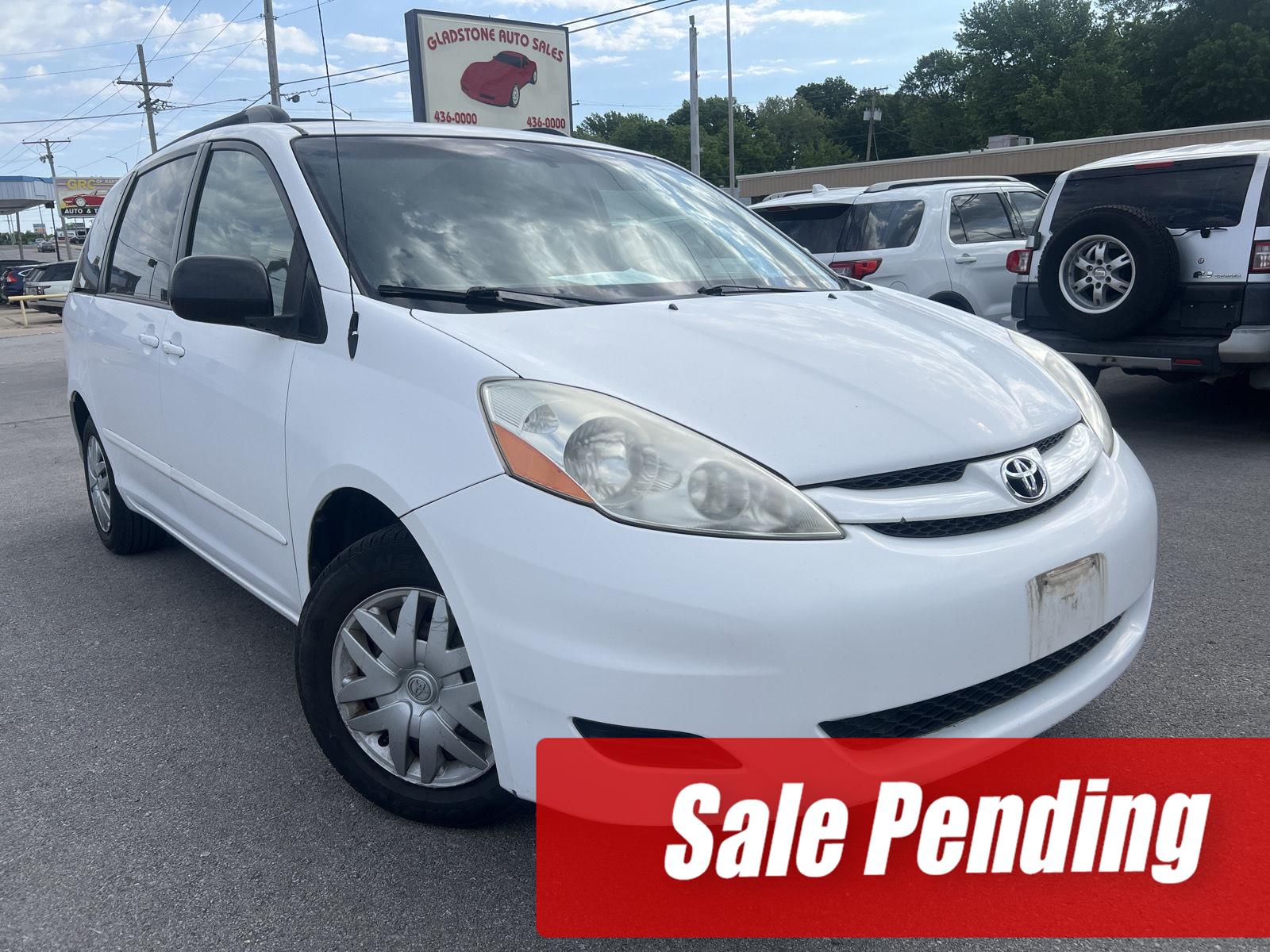 Super White 2009 Toyota Sienna LE 8 Passenger Minivan Front-Wheel Drive Automatic