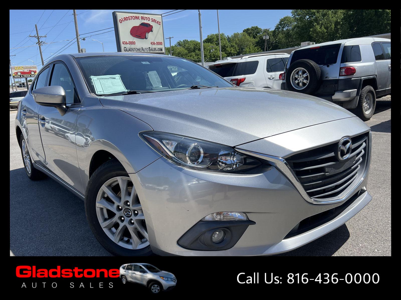 Liquid Silver Metallic 2015 Mazda MAZDA3 i Touring Hatchback Hatchback Front-Wheel Drive Manual