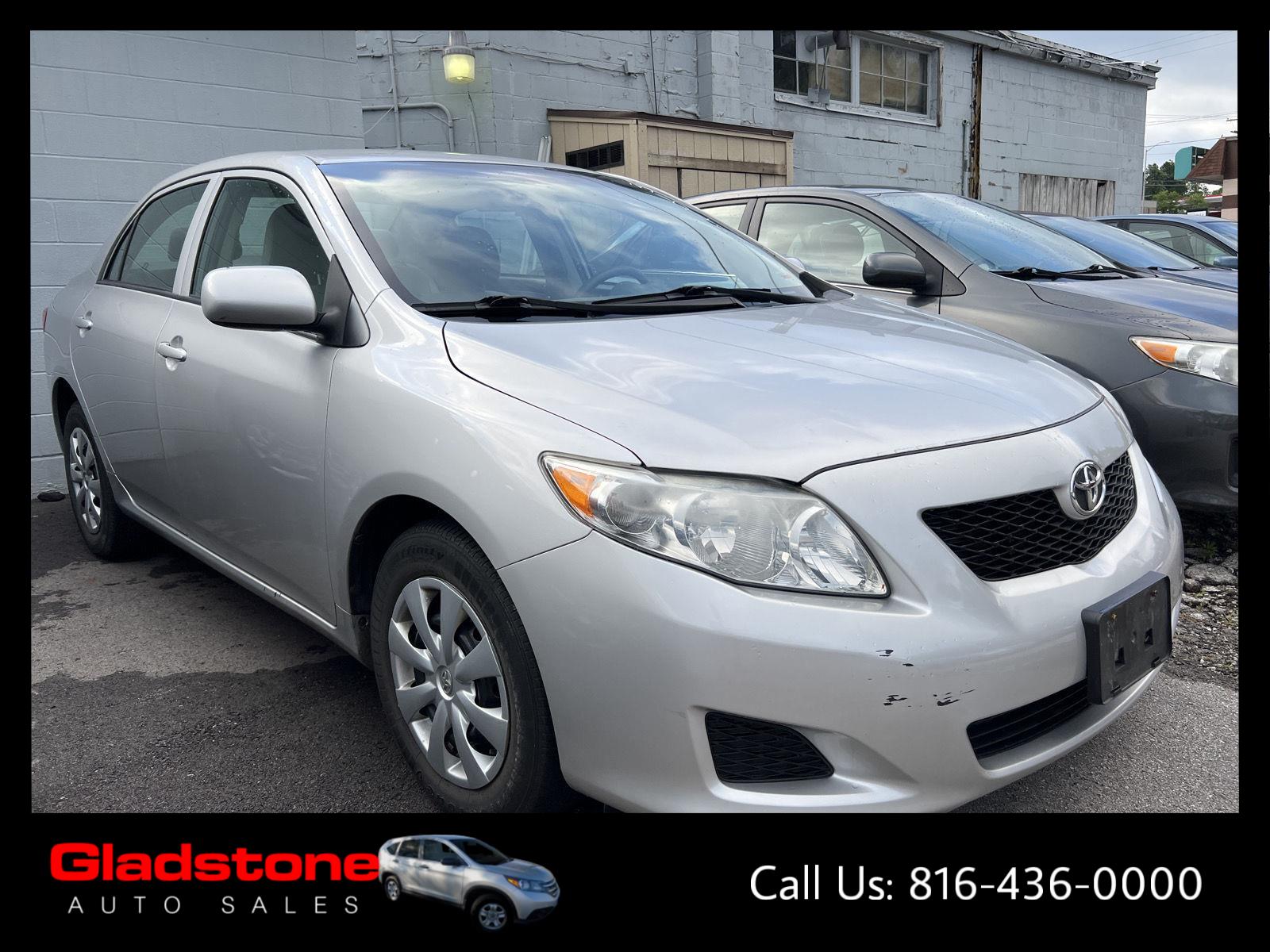 Classic Silver Metallic 2010 Toyota Corolla LE Sedan Front-Wheel Drive Automatic