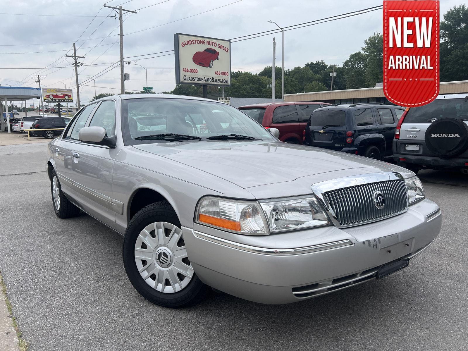 Silver Birch Metallic 2004 Mercury Grand Marquis Sedan Rear-Wheel Drive 4-Speed Automatic Overdrive