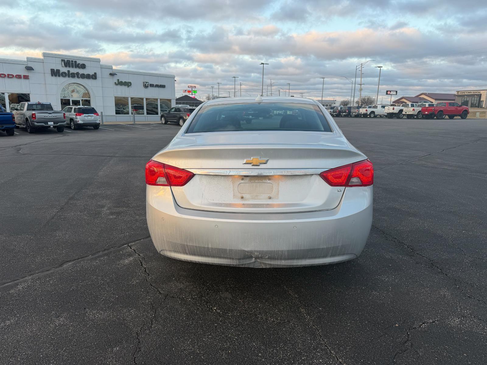 Used 2014 Silver Ice Metallic Chevrolet LT image 4