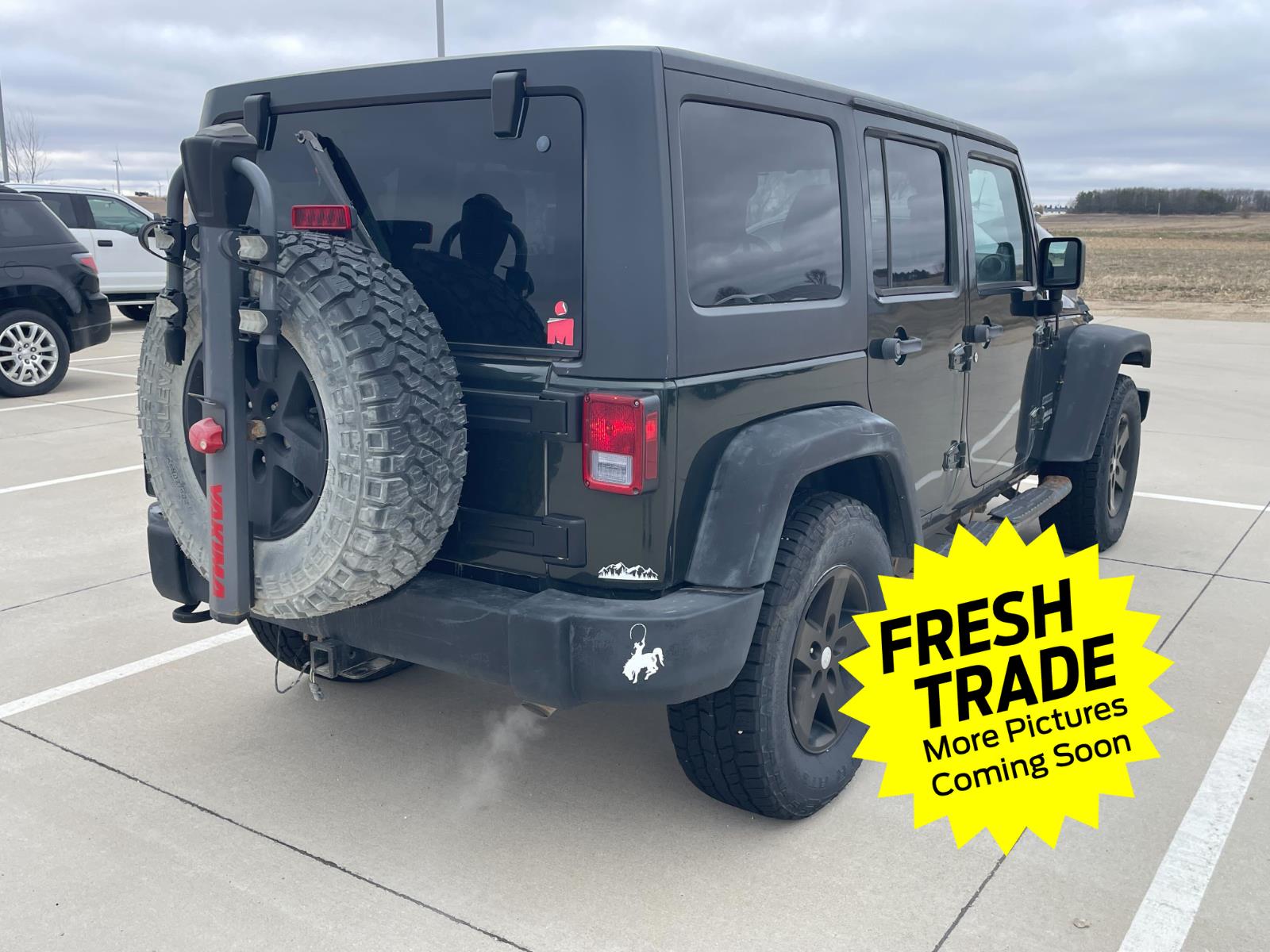 Used 2011 Natural Green Pearl Jeep Sport image 2