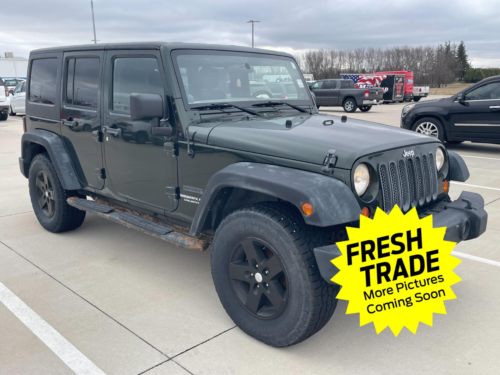 Used 2011 Natural Green Pearl Jeep Sport image 4