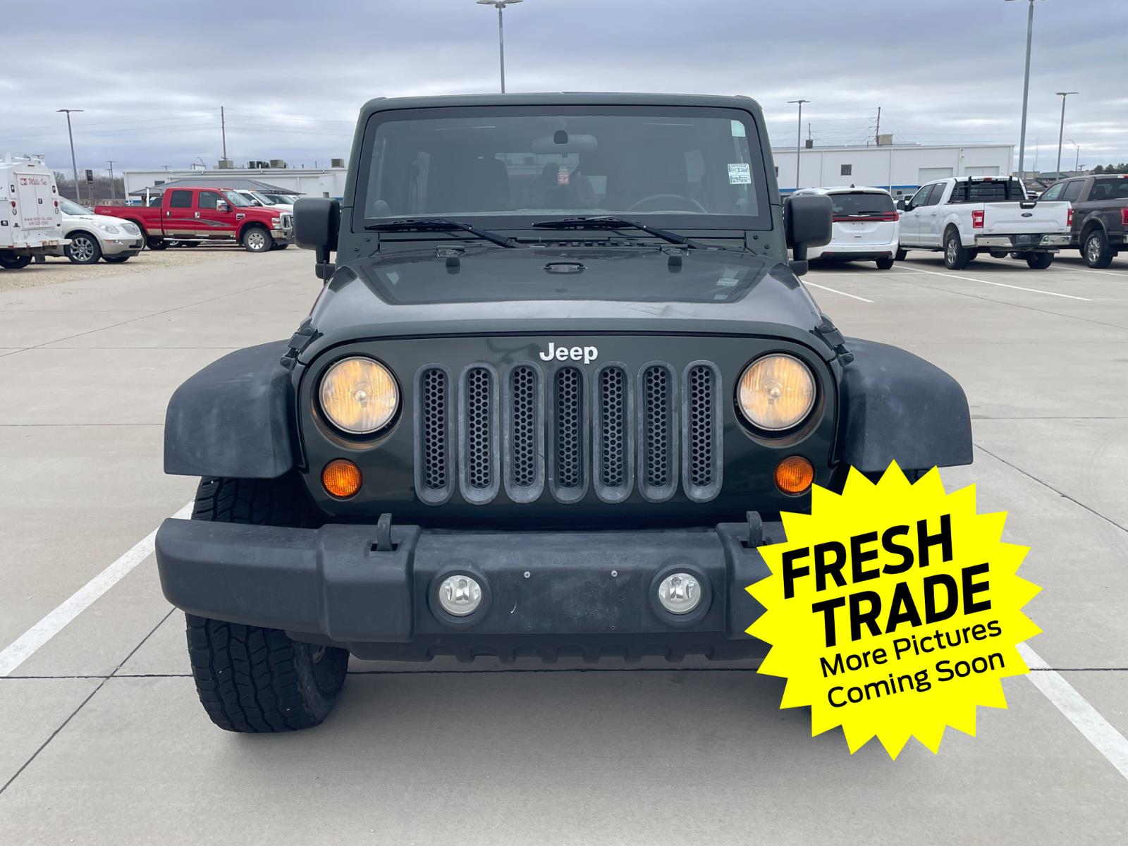 Used 2011 Natural Green Pearl Jeep Sport image 7