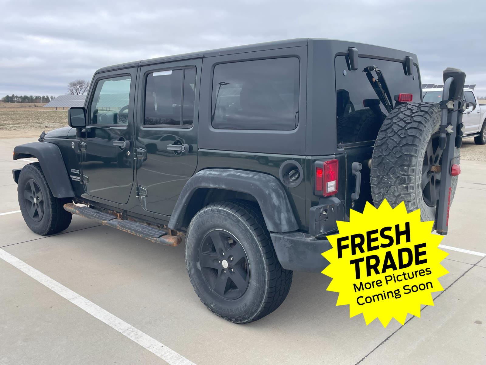 Used 2011 Natural Green Pearl Jeep Sport image 5