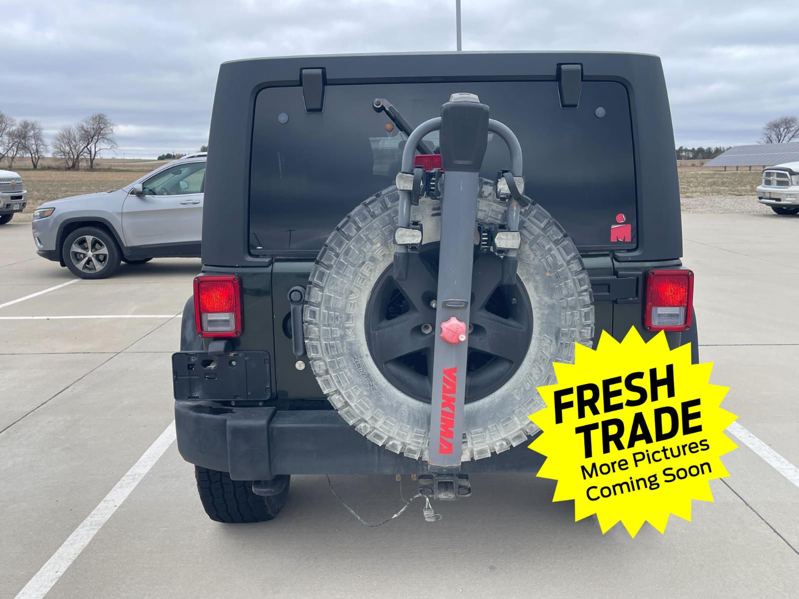 Used 2011 Natural Green Pearl Jeep Sport image 6