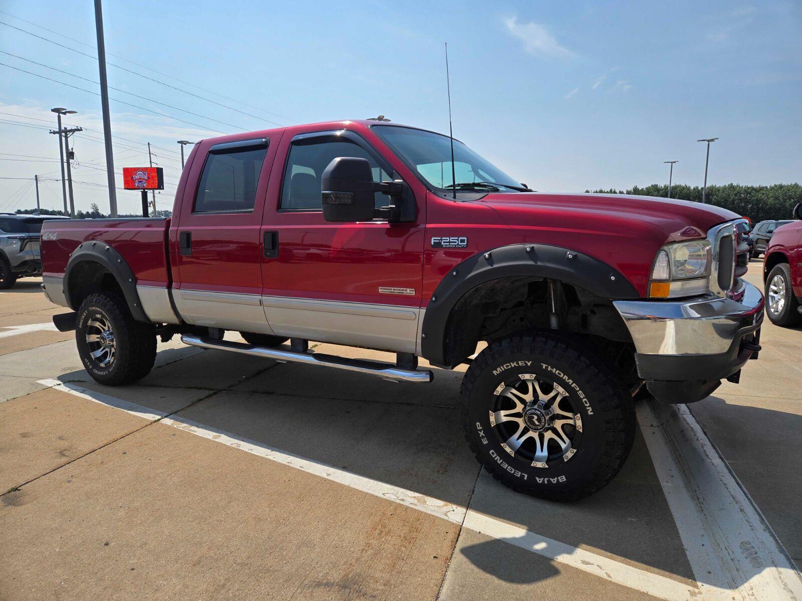Red 2003 Ford F-250 Super Duty Pickup Truck Four-Wheel Drive 6-Speed Manual Overdrive