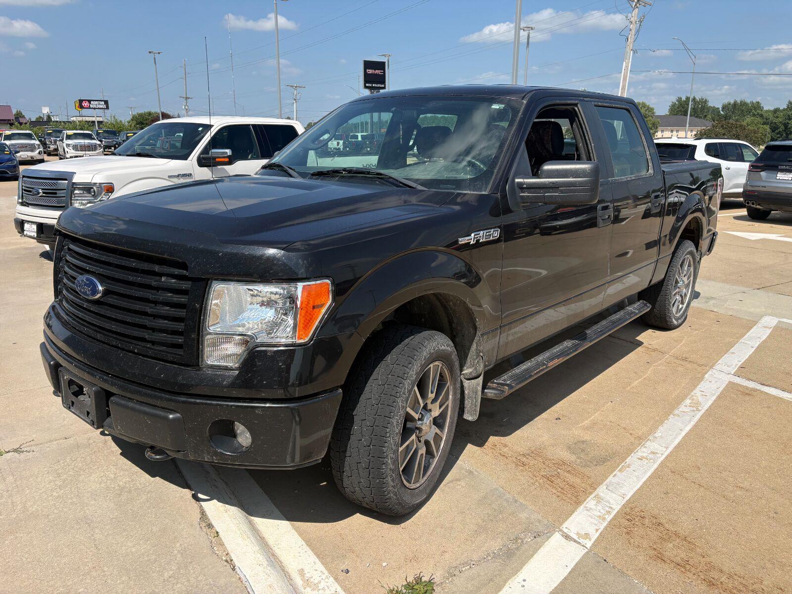 Tuxedo Black Metallic 2014 Ford F-150 Pickup Truck Four-Wheel Drive 6-Speed Automatic