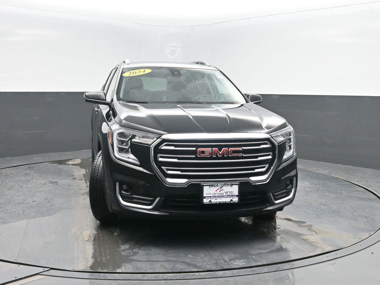 Used 2024 Ebony Twilight Metallic GMC SLT image 44