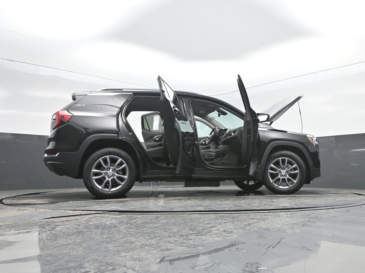 Used 2024 Ebony Twilight Metallic GMC SLT image 53