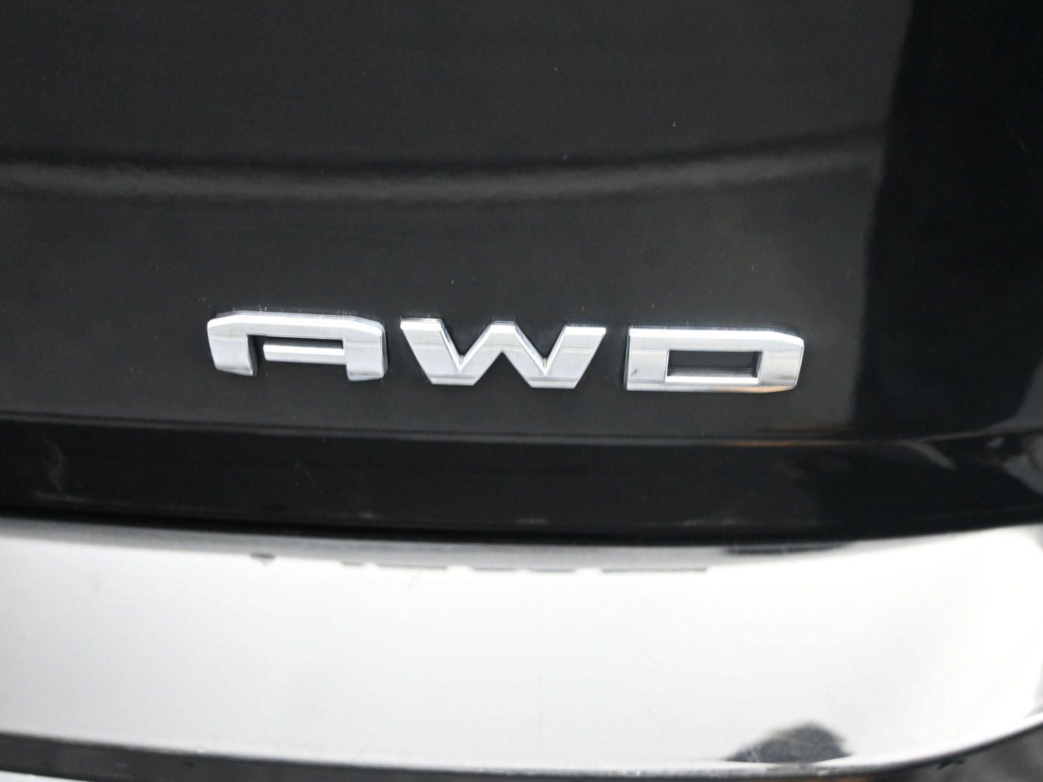 Used 2024 Ebony Twilight Metallic GMC SLT image 15