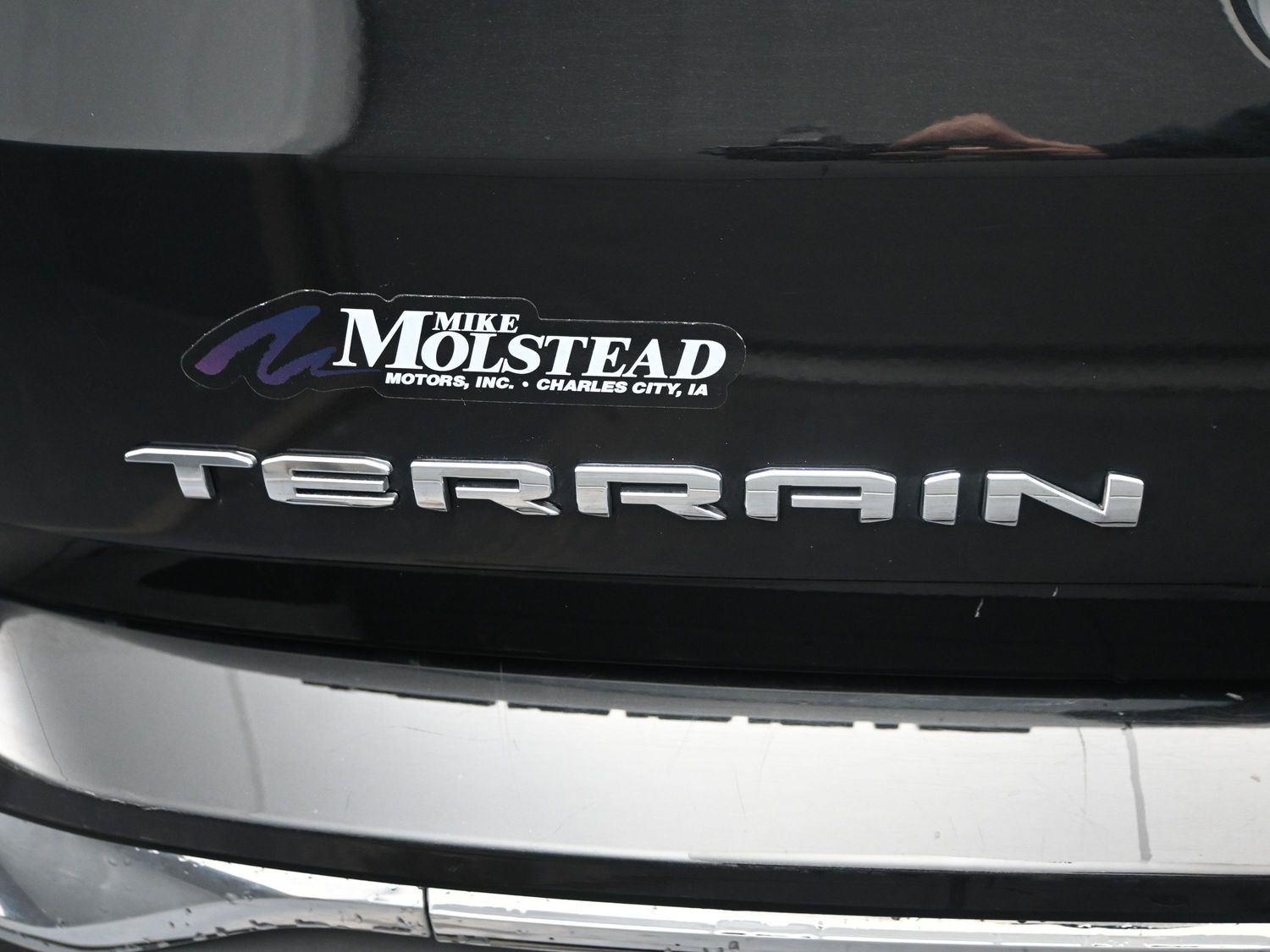 Used 2024 Ebony Twilight Metallic GMC SLT image 16