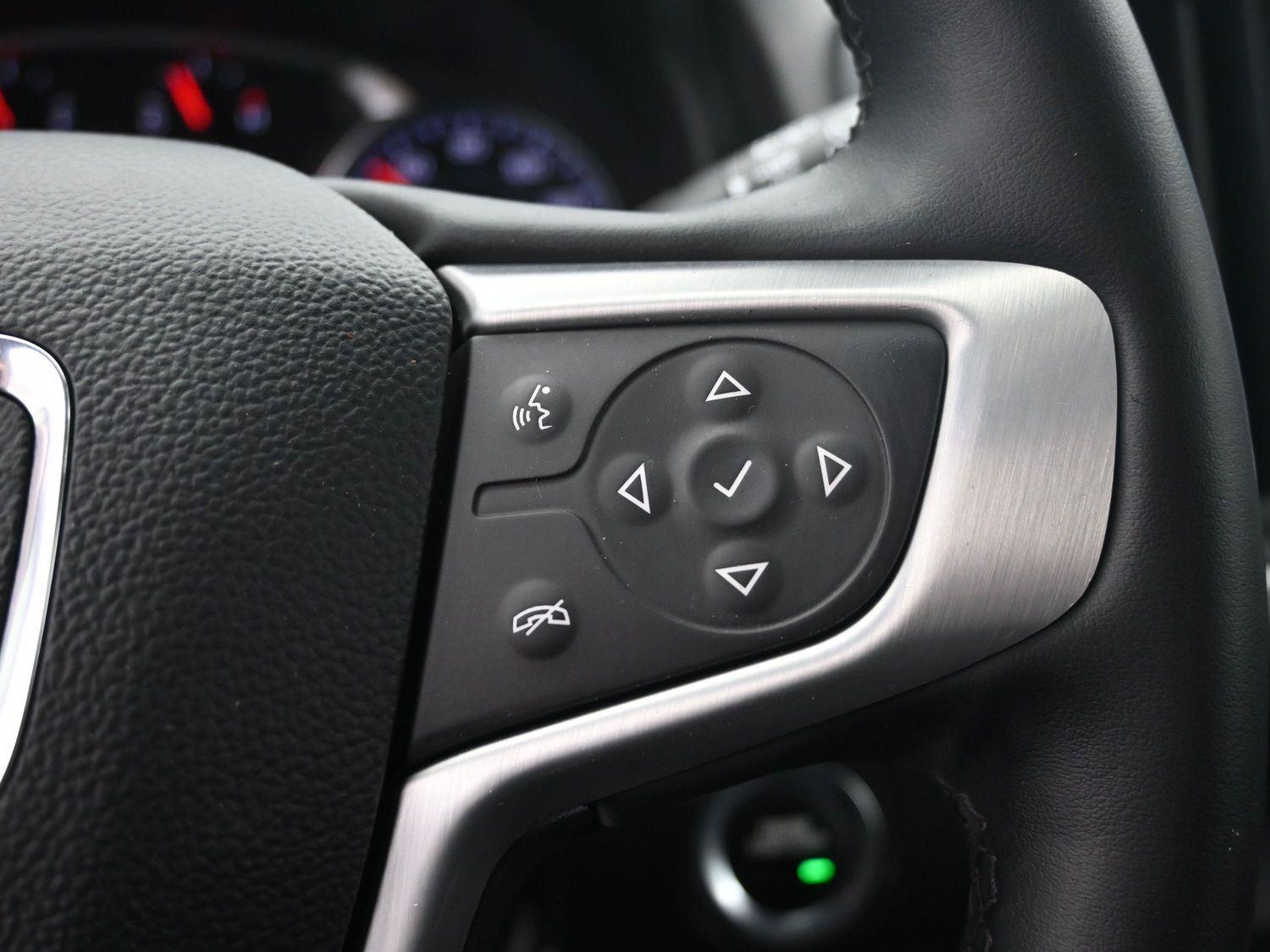 Used 2024 Ebony Twilight Metallic GMC SLT image 25