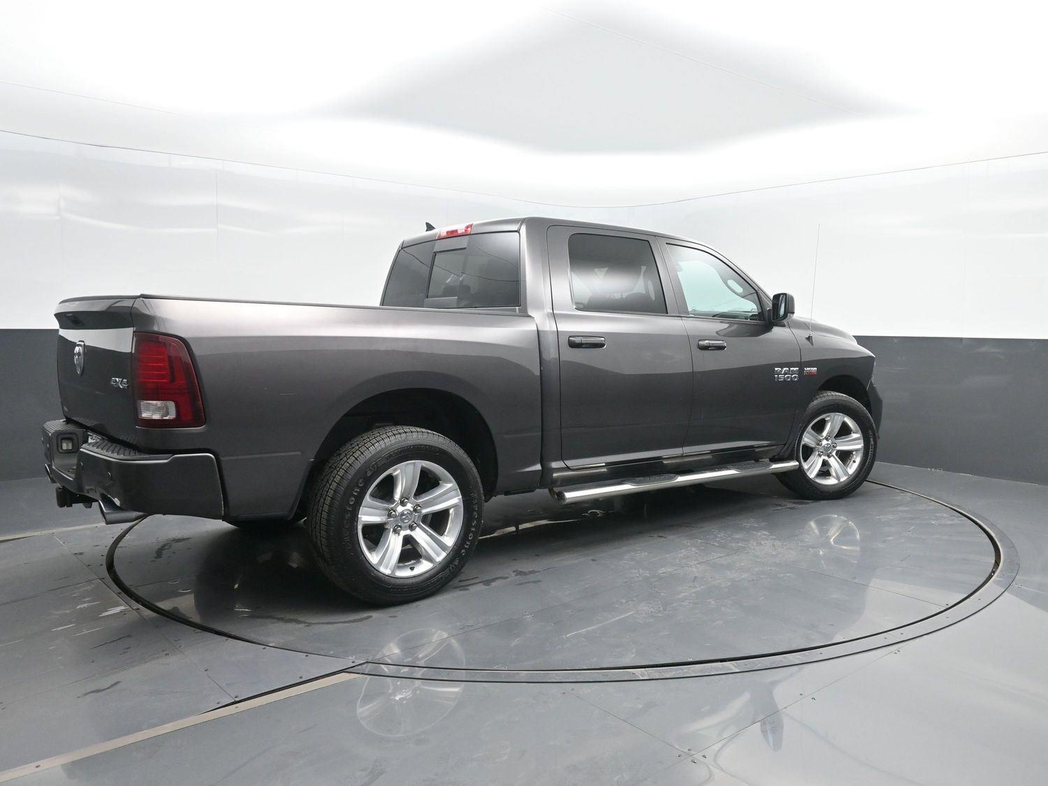 Used 2015 Granite Crystal Metallic Clearcoat Ram Sport image 2