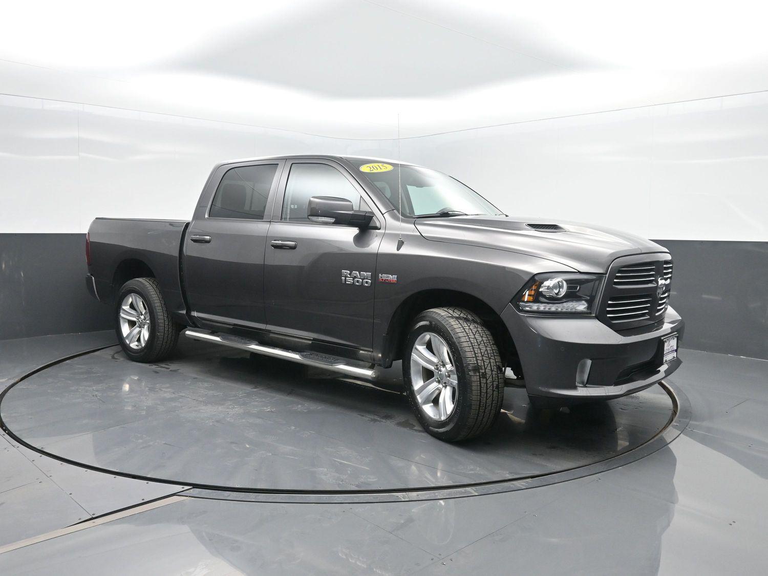 Used 2015 Granite Crystal Metallic Clearcoat Ram Sport image 4