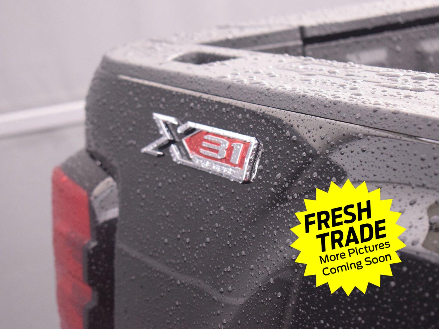 Used 2024 Onyx Black GMC SLT image 16