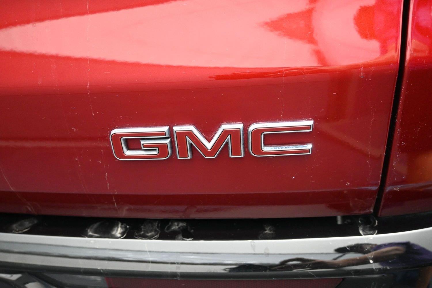 Used 2025 Volcanic Red Tintcoat GMC AWD Denali image 16