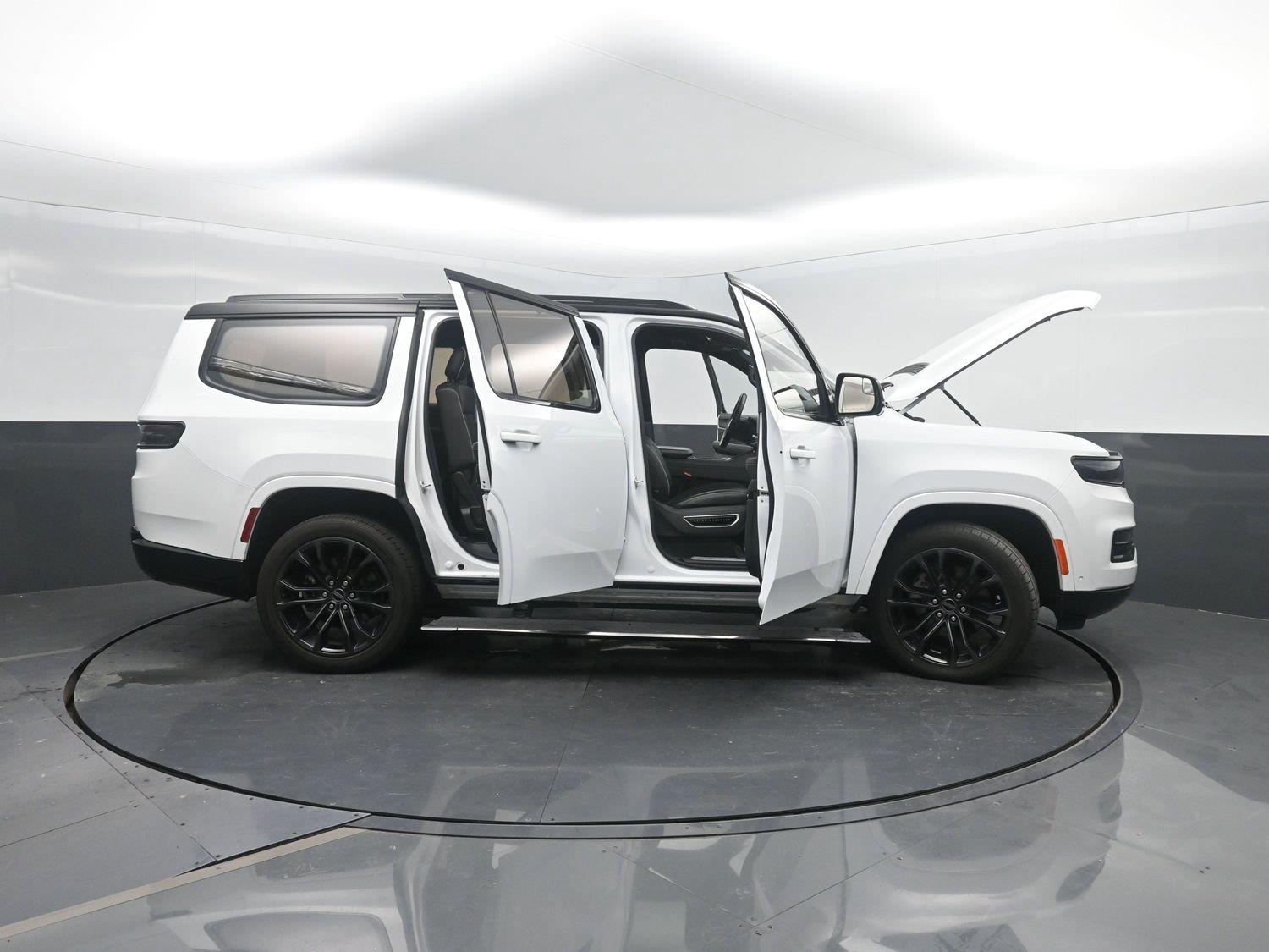 Used 2024 Bright White Clearcoat Jeep Series II Obsidian image 49