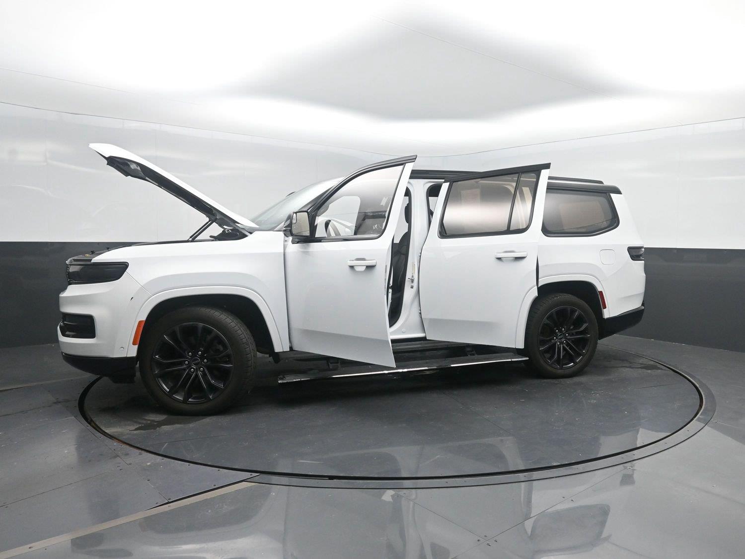 Used 2024 Bright White Clearcoat Jeep Series II Obsidian image 50