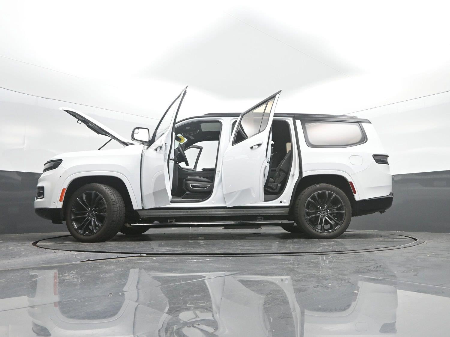 Used 2024 Bright White Clearcoat Jeep Series II Obsidian image 52