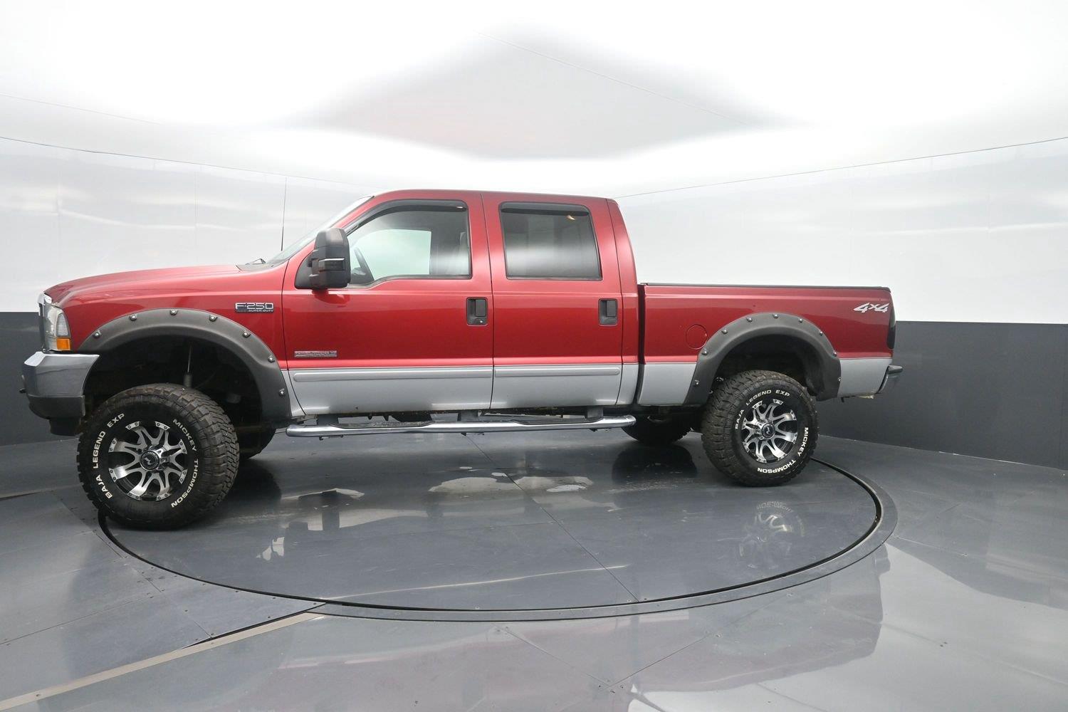 Red 2003 Ford F-250 Super Duty Pickup Truck Four-Wheel Drive 6-Speed Manual Overdrive