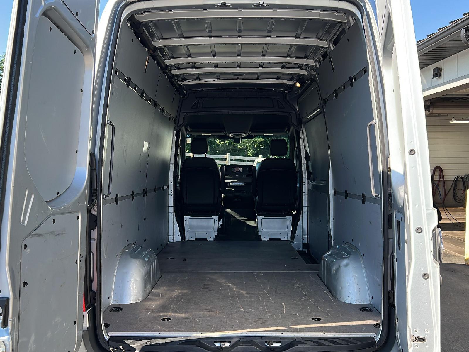 Used 2023 iridium silver metallic Mercedes-Benz Cargo Van 144" High Roof image 8