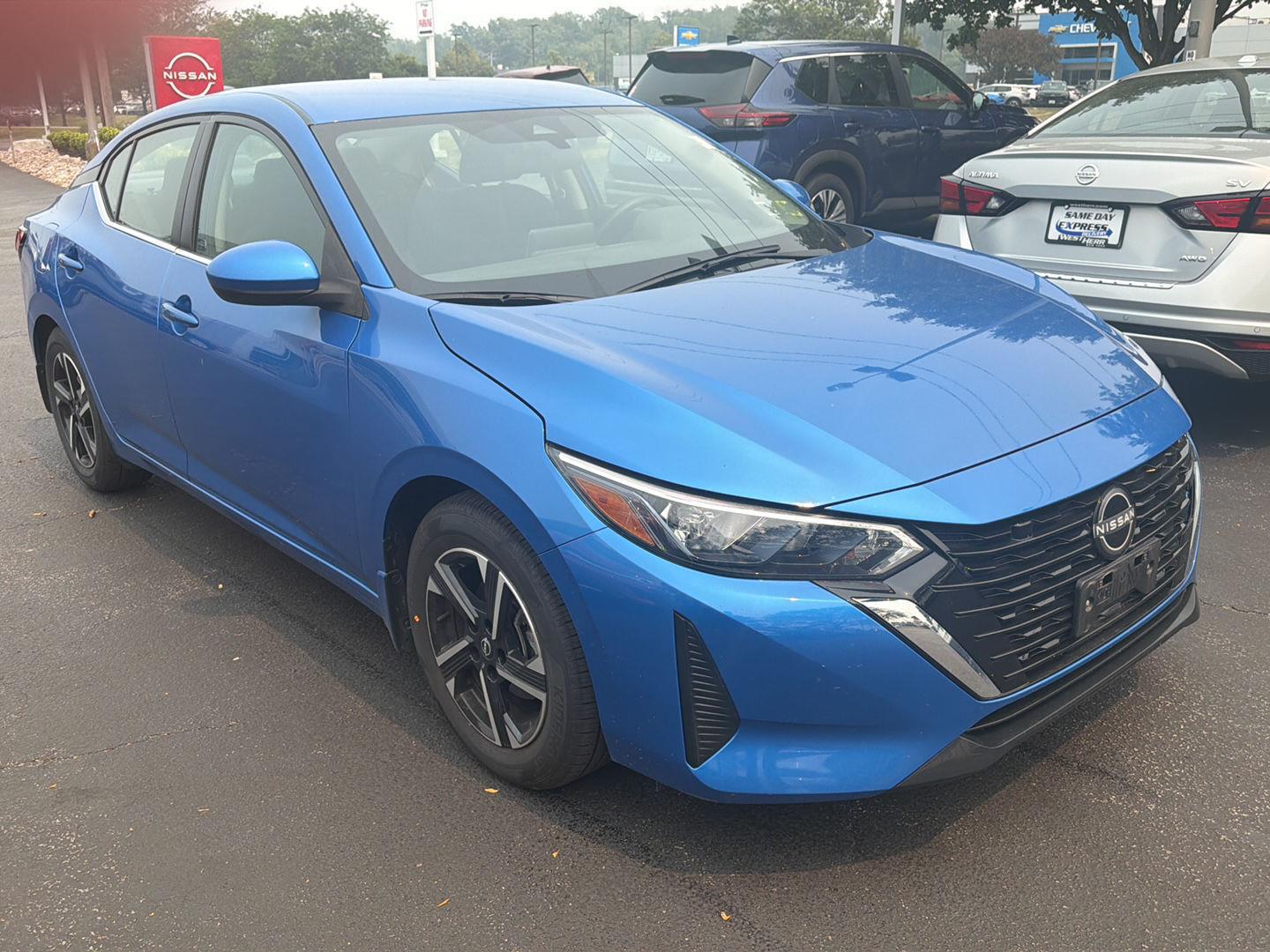 Used 2024 Electric Blue Metallic Nissan SV image 3