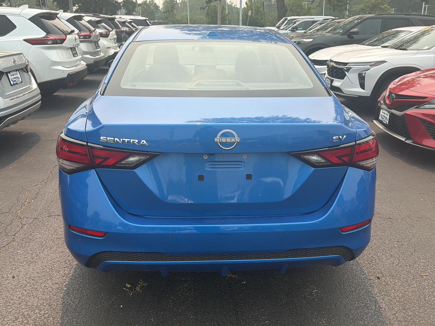 Used 2024 Electric Blue Metallic Nissan SV image 5