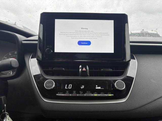 Certified Used 2023 Classic Silver Metallic Toyota LE image 4
