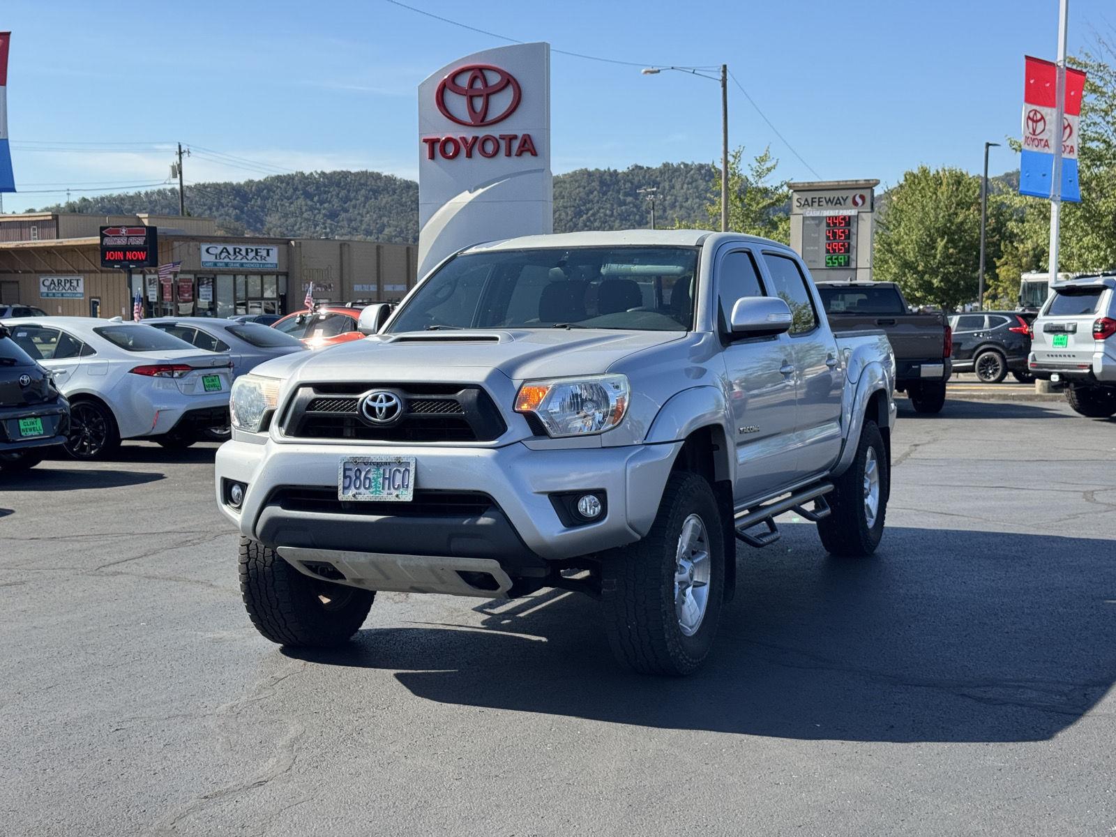 Black 2012 Toyota Tacoma Pickup Truck Four-Wheel Drive Manual