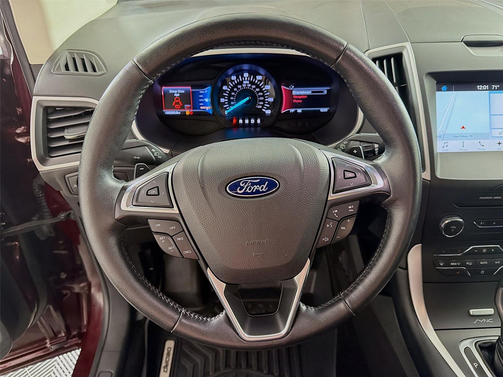 View vehicle photo 3
