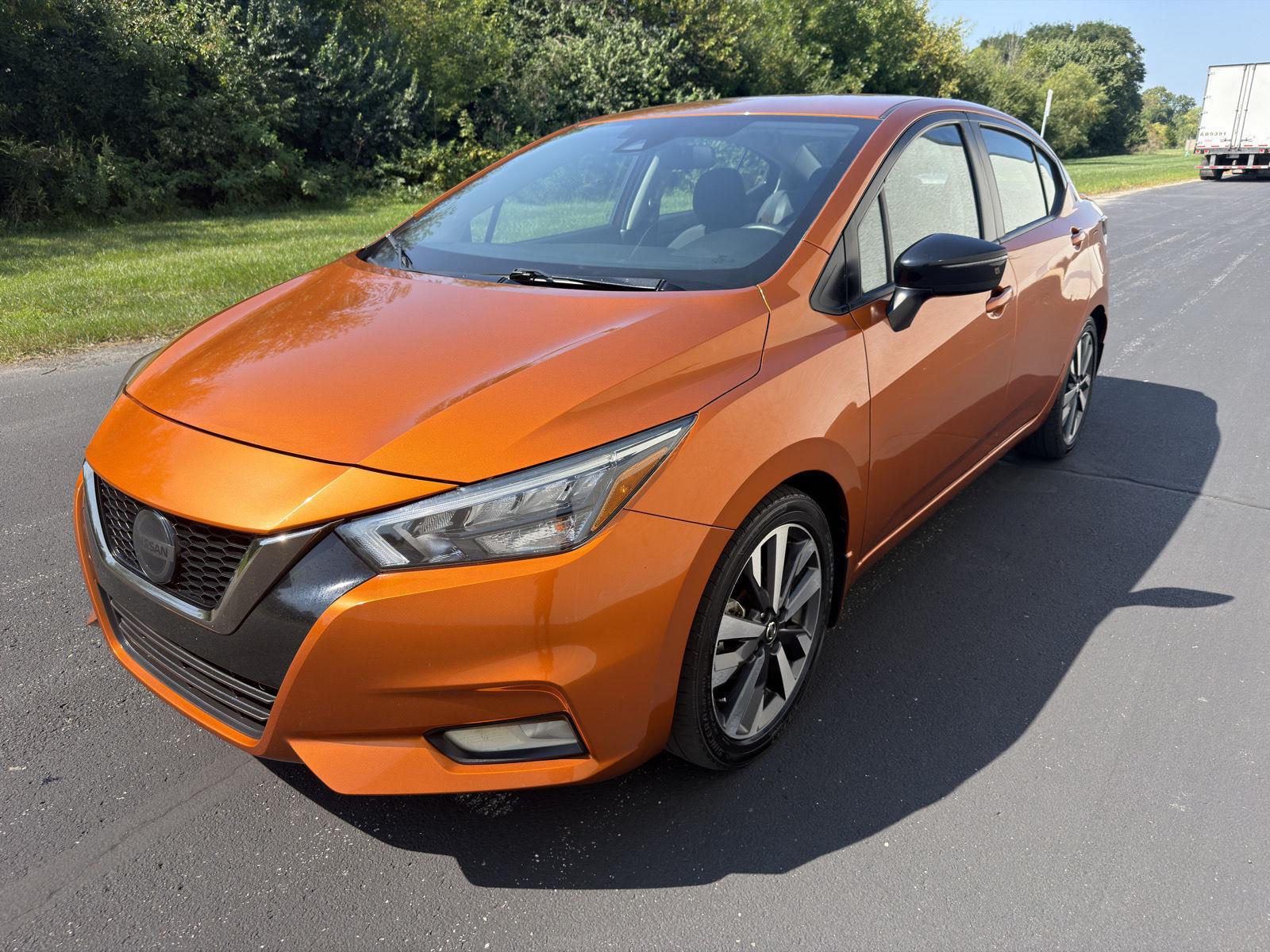 Monarch Orange Pearl Met 2020 Nissan Versa Sedan Front-Wheel Drive Continuously Variable Transmission
